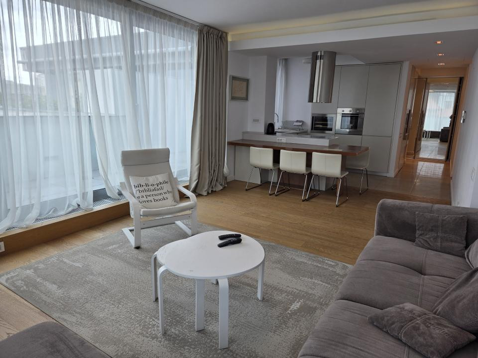 Elegant Top-Floor Apartment with Panoramic Terrace near Victoriei Avenue
