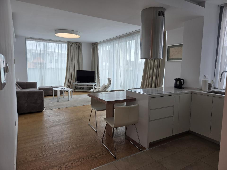 Elegant Top-Floor Apartment with Panoramic Terrace near Victoriei Avenue