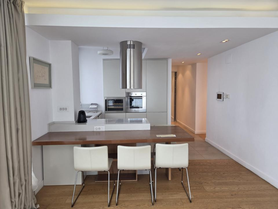 Elegant Top-Floor Apartment with Panoramic Terrace near Victoriei Avenue