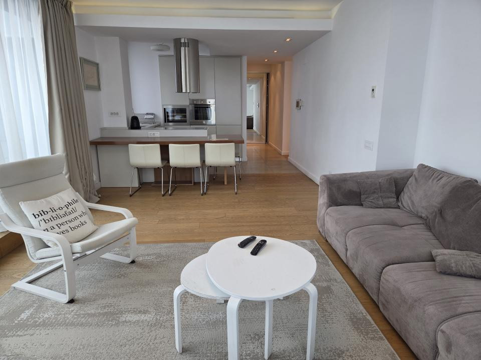 Elegant Top-Floor Apartment with Panoramic Terrace near Victoriei Avenue