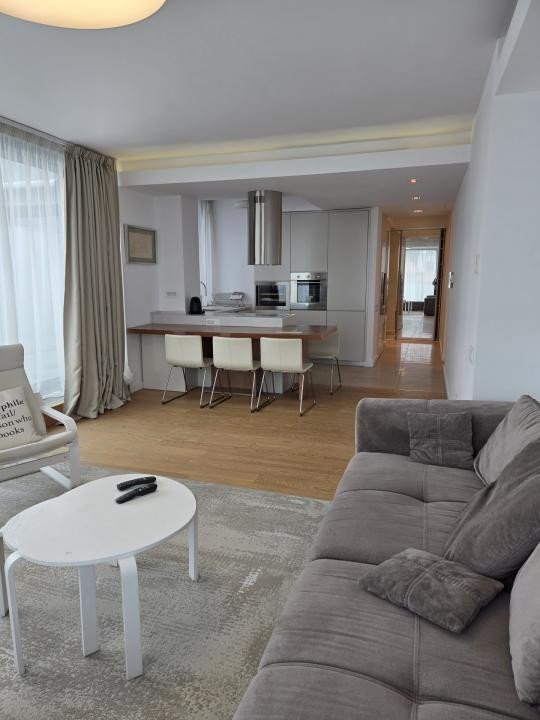 Elegant Top-Floor Apartment with Panoramic Terrace near Victoriei Avenue