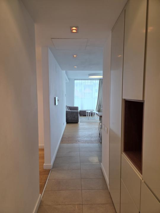 Elegant Top-Floor Apartment with Panoramic Terrace near Victoriei Avenue