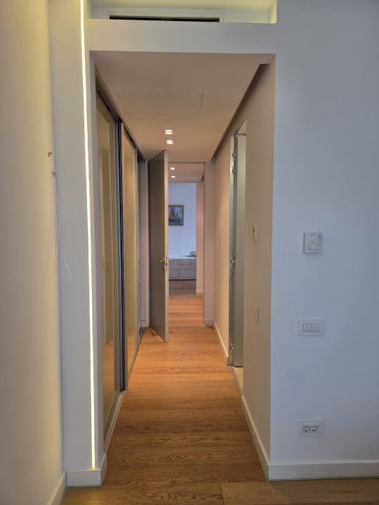 Elegant Top-Floor Apartment with Panoramic Terrace near Victoriei Avenue