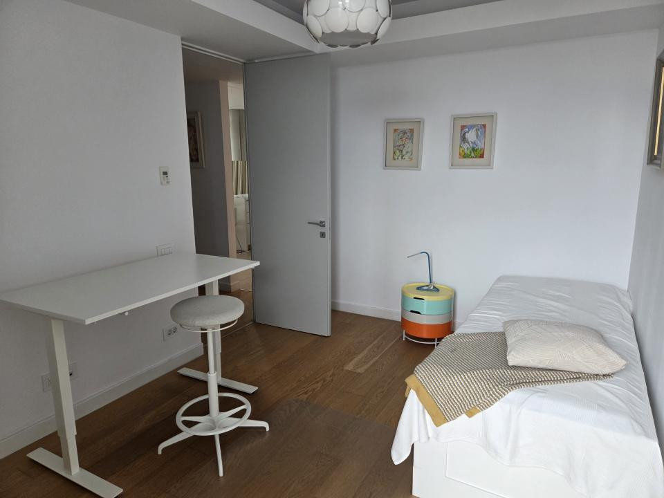 Elegant Top-Floor Apartment with Panoramic Terrace near Victoriei Avenue