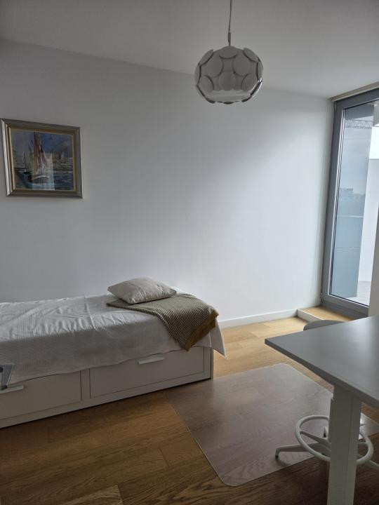 Elegant Top-Floor Apartment with Panoramic Terrace near Victoriei Avenue