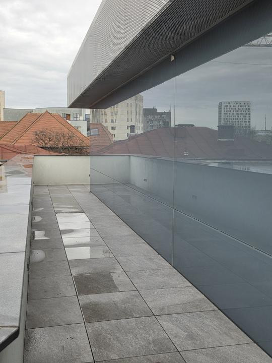 Elegant Top-Floor Apartment with Panoramic Terrace near Victoriei Avenue