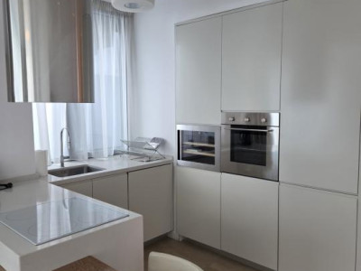 Elegant Top-Floor Apartment with Panoramic Terrace near Victoriei Avenue
