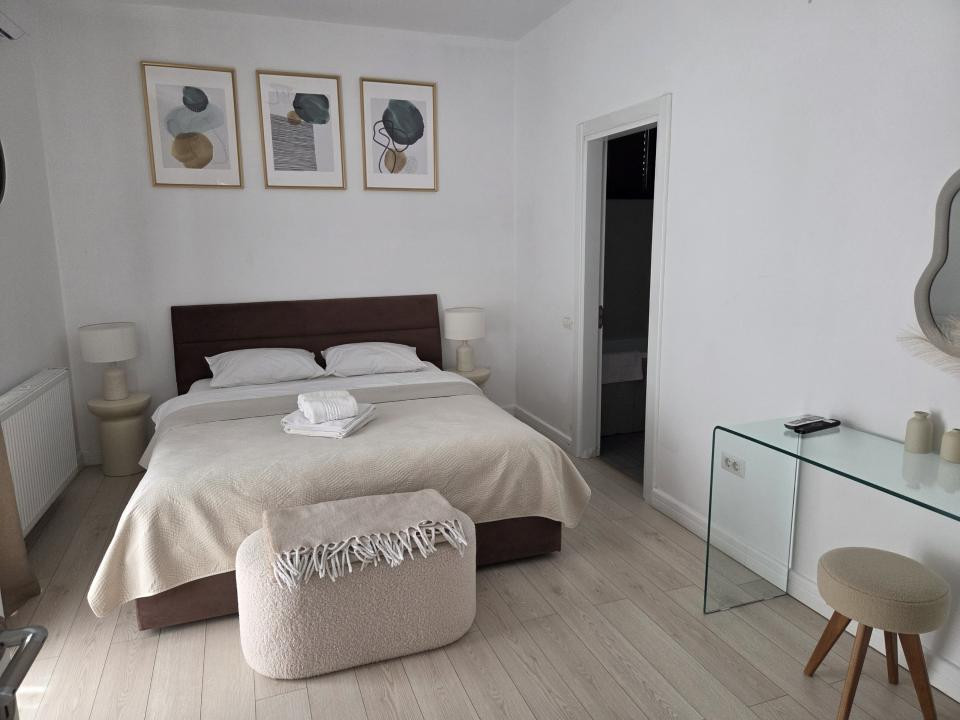 Apartament langa Piata Victoriei, cu terasa generoasa